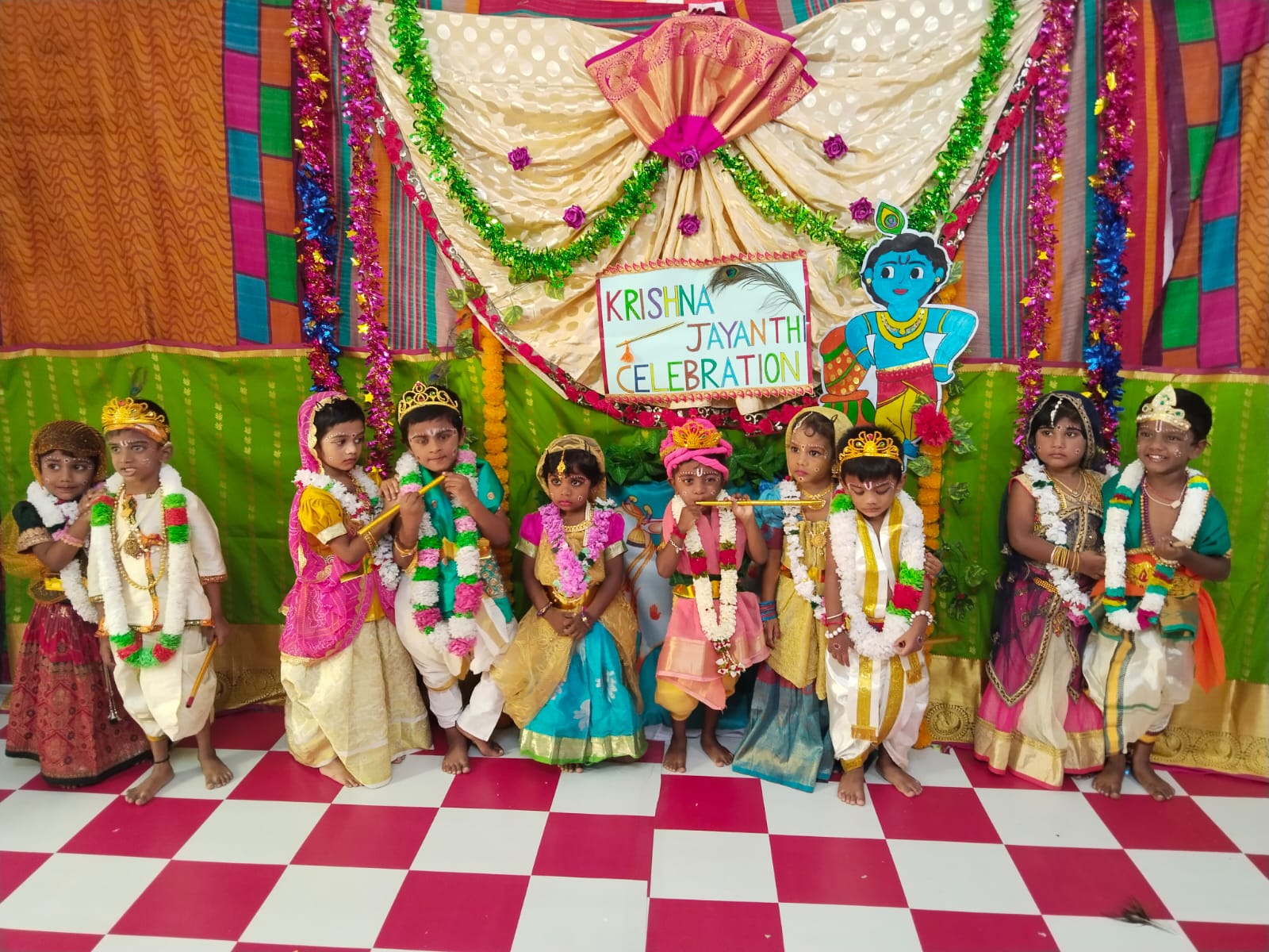 Teacher helping preschool children